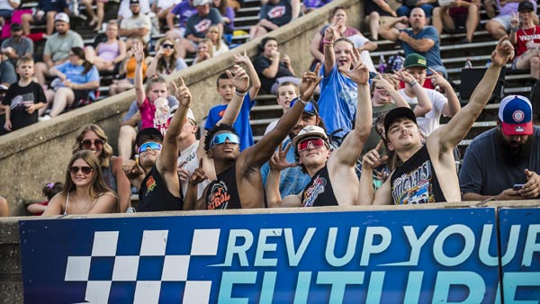 Fans watch on at Bowman Gray Stadium from the grandstands